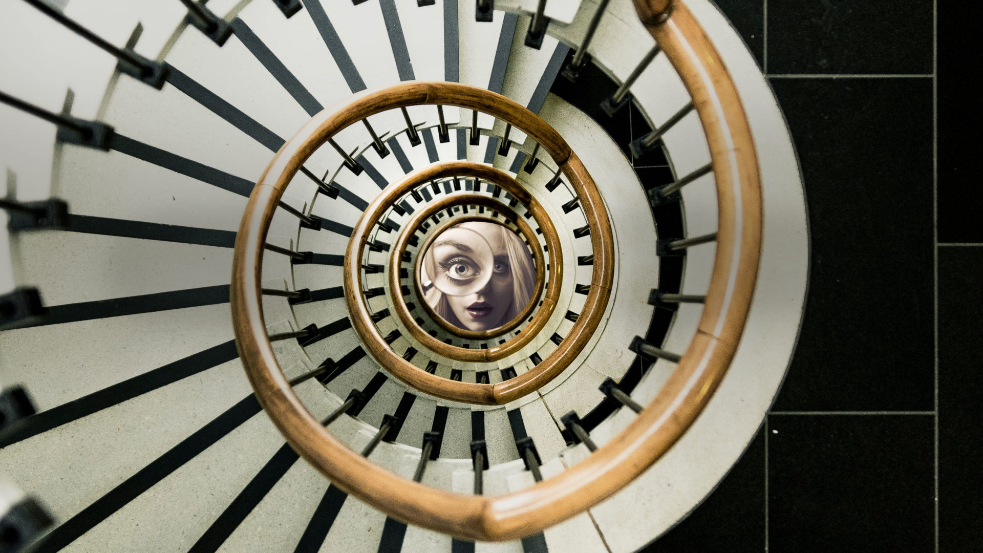 A film poster depicting a spiral staircase. In the middle of the spiral is a young woman holding up a magnifying glass.